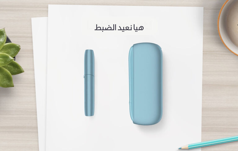 IQOS Originals DUO holder and pocket charger in turquoise color.
