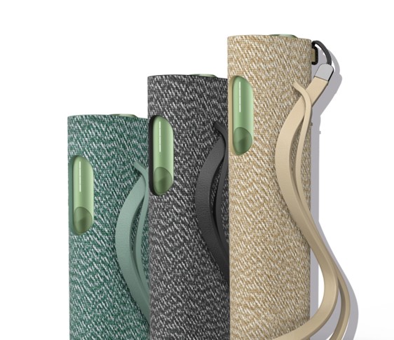 An IQOS ILUMA ONE devices in a person's hand.